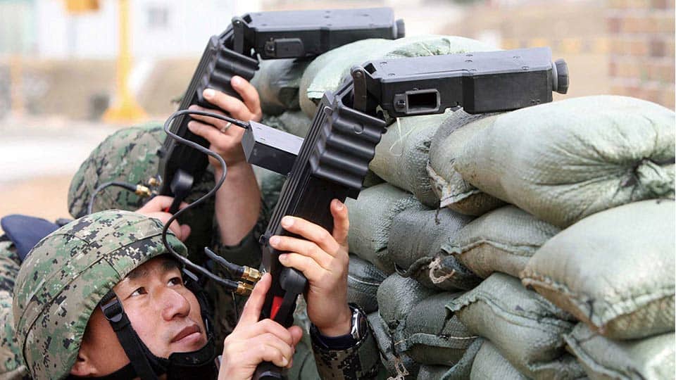 Latest Military Technology - cornorshot gun